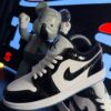 JORDAN RETRO 1 NEGRA BLANCA CHAROL