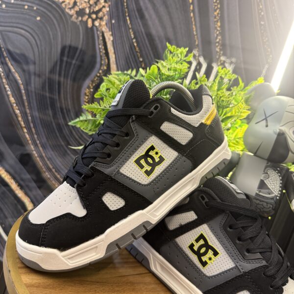 DC SHOES NEGRA AMARILLA